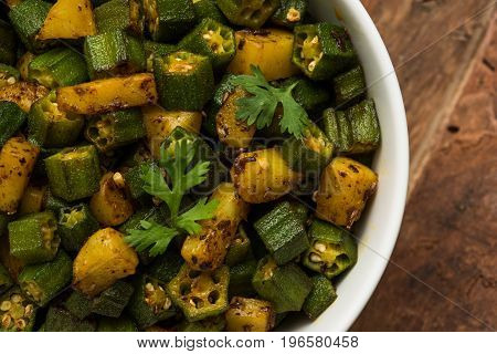 Indian masala fried bhindi or bhendi or Okra or ladyfinger curry or sabji, selective focus