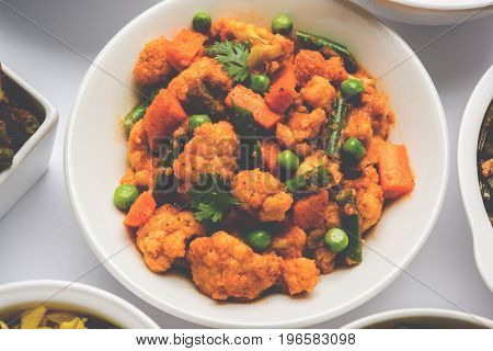 indian spicy food Gobi matar Masala or cauliflower curry with green peas or phool gobi fry, selective focus