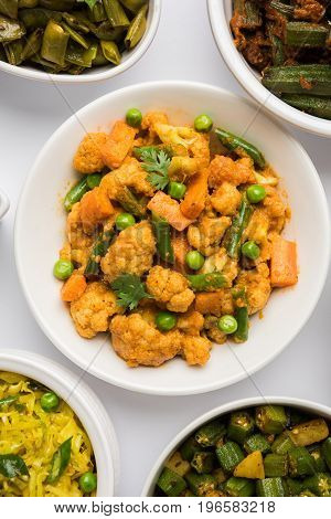 indian spicy food Gobi matar Masala or cauliflower curry with green peas or phool gobi fry, selective focus