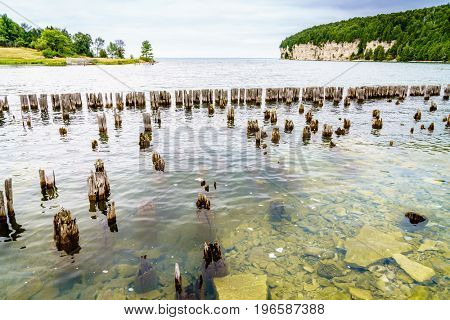 Remnants of docks in Fayette Historic Townsite in Michigan