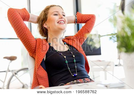 Young woman in office