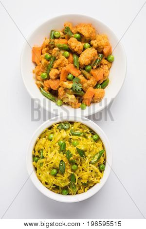 indian spicy food Gobi matar Masala or cauliflower curry with green peas or phool gobi fry and cabbage sabji with matar, selective focus