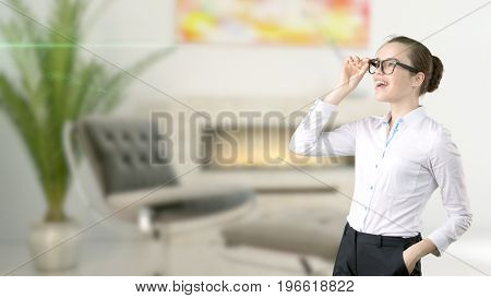 Young Beautiful Business Woman And Creative Designer Standing Over Blured Interior Background