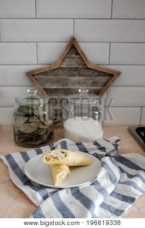 Toasts on a plate on a kitchen set