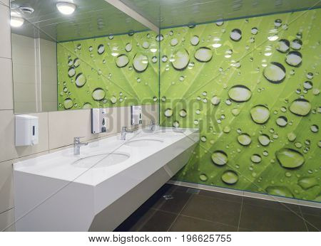 Volgograd Russian Federation - February 17 2017: Public empty restroom with washstands mirror