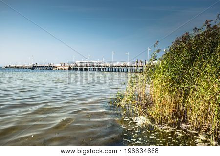 Wooden pier in Jurata town on coast of Baltic Sea Hel peninsula Poland