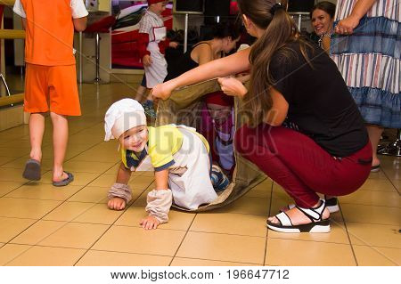 Alchevsk, Ukraine - July 23, 2017: School Cook For Children. Active Games With Children In The Form