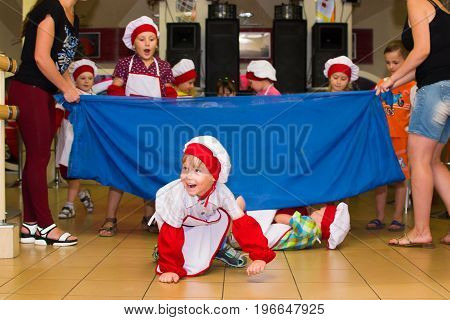 Alchevsk, Ukraine - July 23, 2017: School Cook For Children. Active Games With Children In The Form