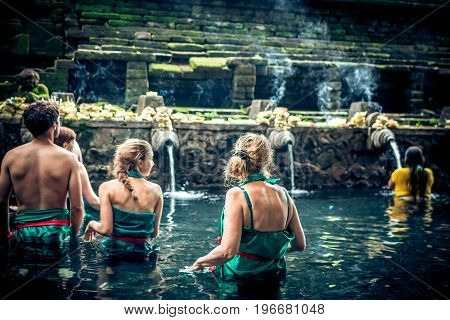 BALI, INDONESIA - MAY 5, 2017: Holy Spring Water Tirta Empul Hindu Temple , Bali