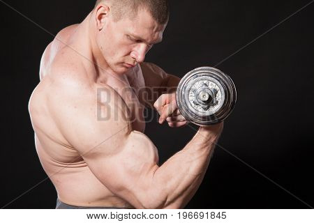 Sport The Athlete Bodybuilder Shakes Their Muscles Dumbbells