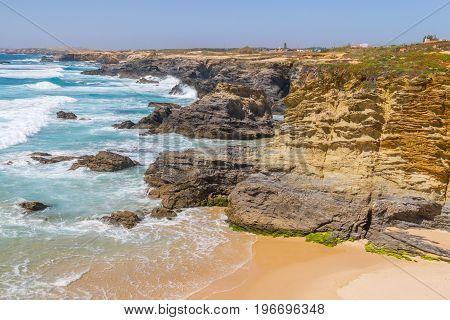 Beach And Cliffs In Porto Covo