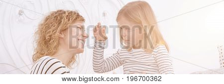 Small Girl With Mother