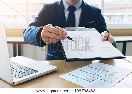 Job application interview Executive manager filling up the application form to applicant register Hiring concept.