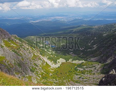 Krkonose Mountains Scenery With Two Mountain Lakes, Green Grass And Rocks