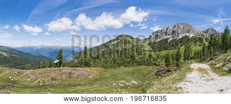 Nassfeld in Carnic Alps with mountain Gartnerkofel and High Tauern with Grossglockner in the background