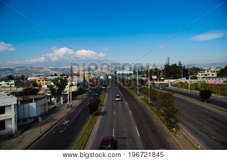 QUITO, ECUADOR- MAY 23, 2017: Main avenue, highway with cars on the road in the city of Quito.