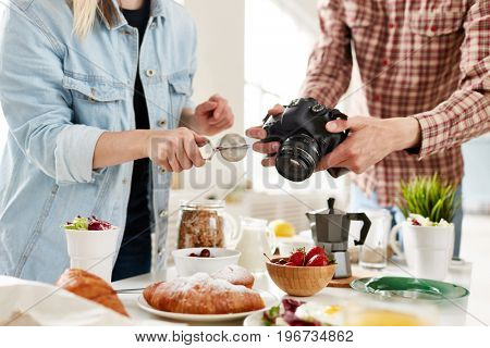 Food-photographer and food-stylist producing food advert