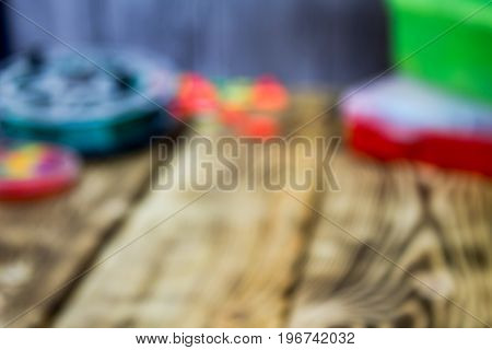 fishing acsessories blurred background on the wooden table
