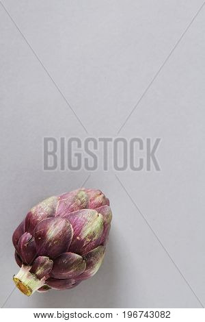 Baby Ripping Organic Artichokes. Food For A Vegan And A Vegetari