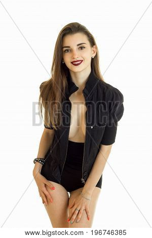 vertical portrait pretty smiling girl in a black suit is isolated on a white background