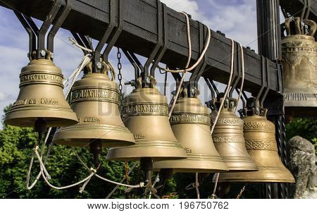 The photo of old orthodox copper church bells. Sepia.