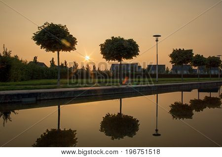 sunset on a riverside promenade in Viersen