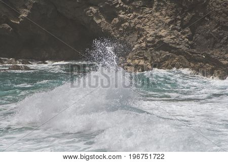 breaching waves at the coast of Fuerteventura