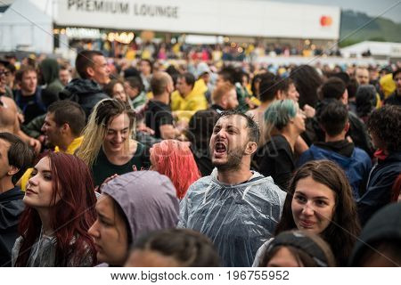 Headbanging Crowd In The First Row At A Hardcore Concert