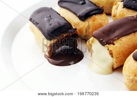 Traditional French Dessert. Eclair With Chocolate Icing. Pastery Concept