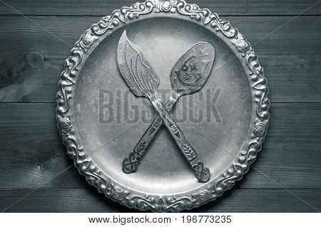 Few Vintage Silver Kitchen Utensil With Ornaments On Silver Tray