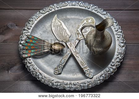 Vintage Silver Kitchen Utensil With Ornaments On Silver Tray