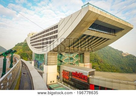 HONG KONG, CHINA - JANUARY 22, 2017: View of the Peak Tower in Hong Kong a top Victoria Peak. At 428 meters above sea level, this iconic landmark features the highest viewing platform in Hong Kong.