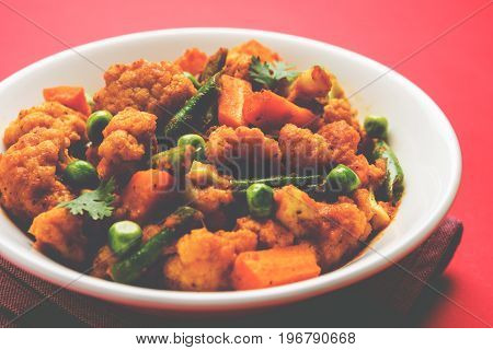 indian spicy food Gobi matar Masala or cauliflower curry with green peas or phool gobi fry, selective focus