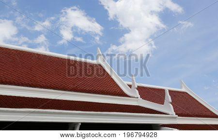 roof of the Thai temple decorated by Buddhist scriptures.
