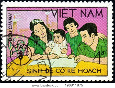 UKRAINE - CIRCA 2017: A postage stamp printed in Vietnam shows Family from series World Food Day circa 1983