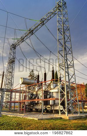 Power transformer in high voltage switchyard in modern electrical substation