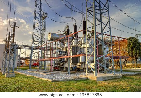 Power transformer in high voltage switchyard in modern electrical substation