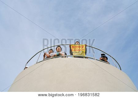 SEOUL, SOUTH KOREA -  MAY 20, 2017: people at Seoul 7017 Skypark at daytime. The Seoullo 7017 Skypark, is an elevated linear park in central Seoul  which opened on May 20, 2017.