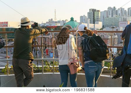SEOUL, SOUTH KOREA -  JUNE 01, 2017: people at Seoul 7017 Skypark. The Seoullo 7017 Skypark, is an elevated linear park in central Seoul  which opened on May 20, 2017.