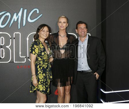 LOS ANGELES - JUL 24:  Beth Kono, Charlize Theron, AJ Dix at the 