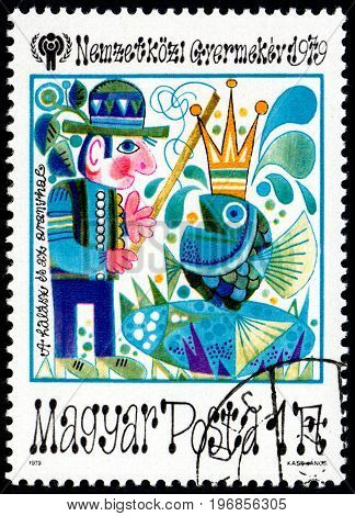 UKRAINE - CIRCA 2017: A postage stamp printed in Hungary shows Fairy Tale Scenes from The fisherman and the goldfish from series International Year of the Child circa 1979