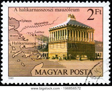 UKRAINE - CIRCA 2017: A postage stamp printed in Hungary shows Mausoleum Halikarnassos from series Seven Wonders of the Ancient World circa 1980