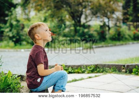 Cute Little Boy Looking Up The Sky In Sunny Day. Child Dreaming, Hope Concepts.