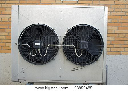 Air conditioner in front of a wall