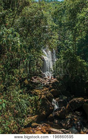 Itatiaia, Brazil - January 20, 2015. View of waterfall and people in the Itatiaia Park, an altitude park, known for its wildlife, trails and forests. Rio de Janeiro State, southwestern Brazil