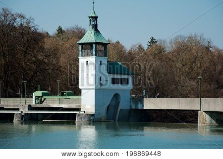Hydroelectric dam on Kuhsee in Augsburg in summer