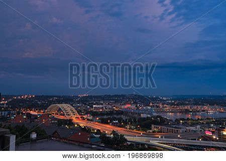 The Ohio River runs between Cincinnati, OH and the Kentucky cities of Newport and Covington