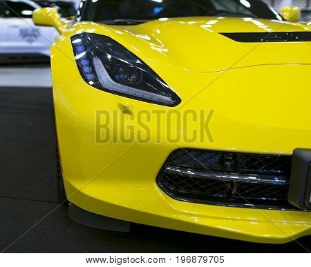 Sankt-Petersburg Russia July 21 2017: Front view of a yellow Chevrolet Corvette Z06. Car exterior details. Photo Taken on Royal Auto Show July 21