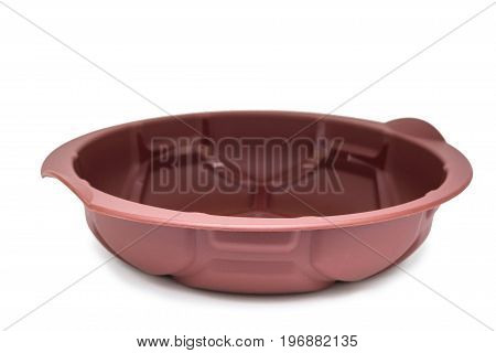 Close up round silicone baking pan isolaed on whie background