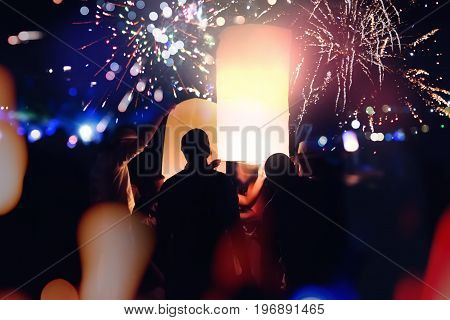 People Celebrate New Year. Fireworks circle blur. Colorful in celebration. Thailand Beach